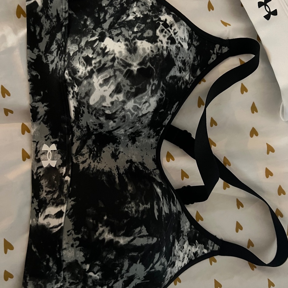 Two (2) under armour sport bras brand new with tag size med